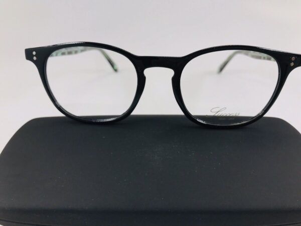 Two lenses arranged in the SUCCESS SS-101 Eyeglasses frame